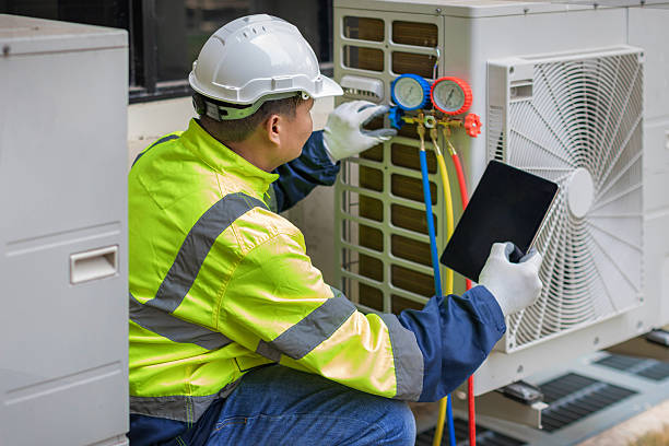 Professional Air Duct Cleaning technician working in Oakland, MO